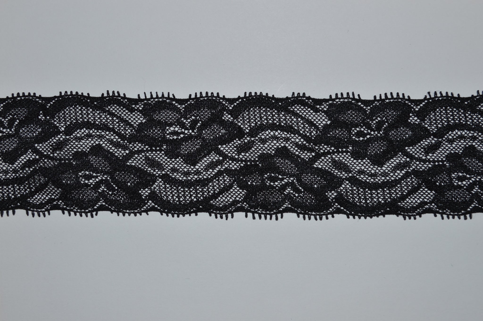 Black Lisianthus, Double Scallop Border. Stretch Lace Fabric. SL